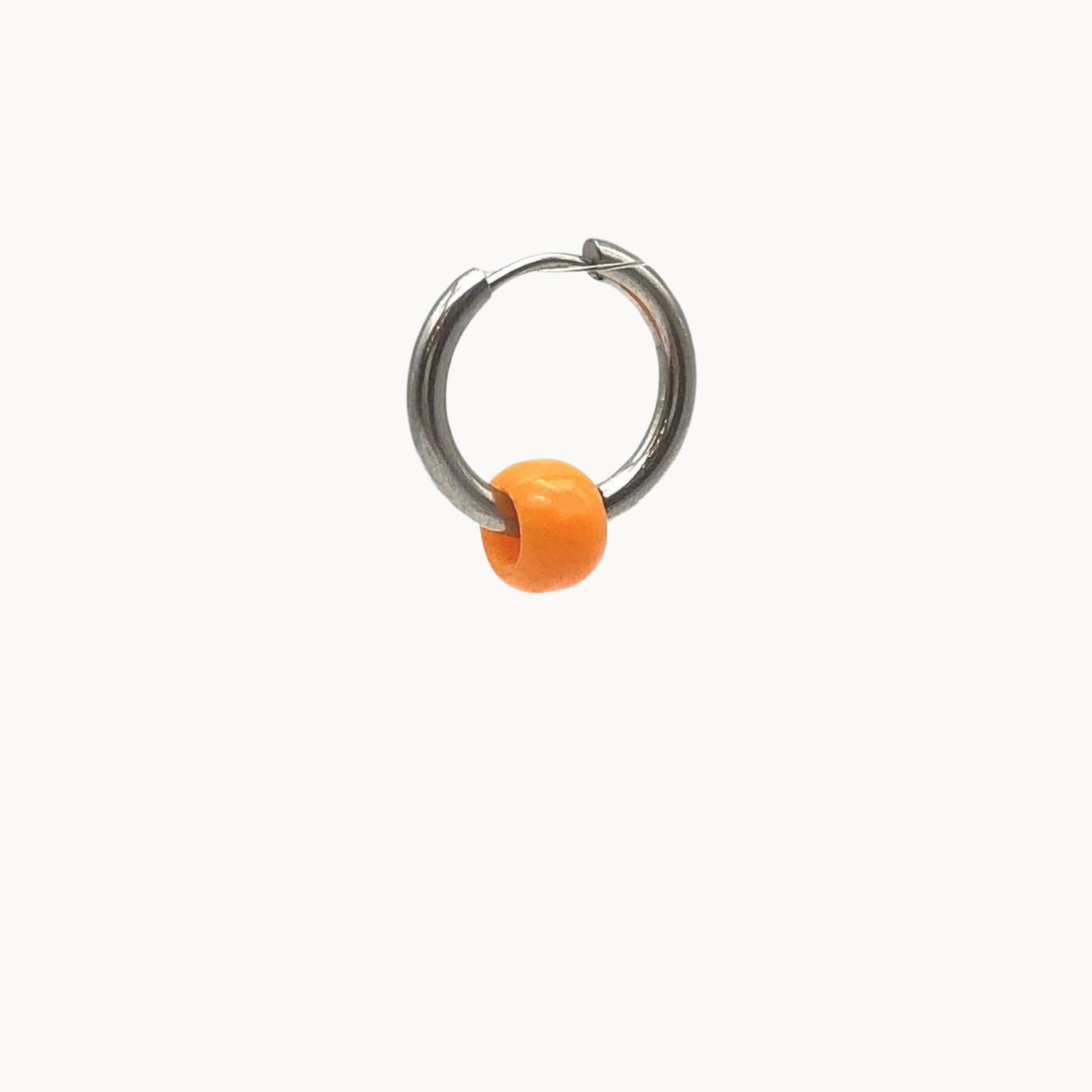 ORANGE HOLLOW BEAD - CIRCLE OF DOTS