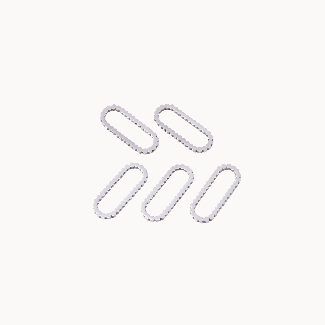 OVAL SHAPE CHARM - CIRCLE OF DOTS
